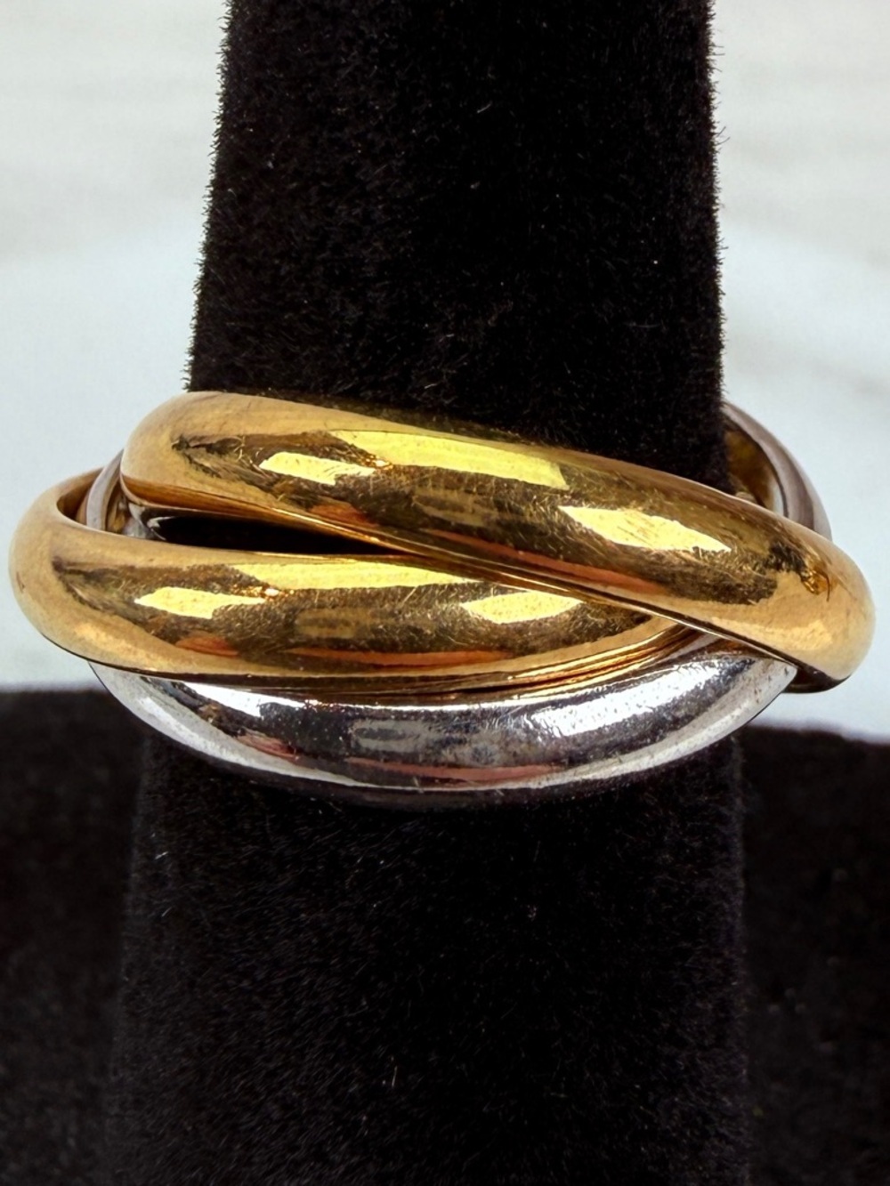 Vintage goldtone and silvertone attached three rings, size 5